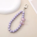 Detail of purple beaded keychain featuring a holographic bear charm and silver spring clasp - Charm / K1695 Bear Pendant Purple