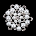 Close-up of a silver floral brooch with radiant white pearls and sparkling rhinestones - Silver Radiant Artificial Pearl Style (XD1331-4)
