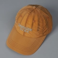 Detail of embroidered 'Dreams Come True' text on yellow quick-dry nylon baseball cap - M (56-58cm) / Orange