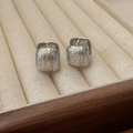 Minimalist square hammered silver earrings featuring an irregular textured surface finish - Silver