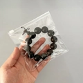 Black round bead bracelet in a transparent PVC jewelry ziplock storage bag - Slider Bag 13*13cm