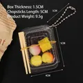 Miniature food bento keychain with tiny corn kernels and model chopsticks in a clear box - 1 Purple Grape + 1 Corn + 1 Peach + 1 Yellow Peach + 1 Orange Peach