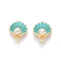 Detail of gold seashell charms with blue enamel finish and white pearl center on white base - Blue