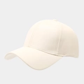Detailed side view showing the smooth faux leather texture and seams of a cream baseball cap - Adjustable / Beige