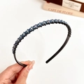 Schmaler schwarzer Haarreif mit blauen Steinchen und Zähnen für sicheren Halt im Haar - Blau