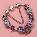 Purple charm bracelet featuring clover pendants and violet crystals on a snake chain - Sl023318/1216-13