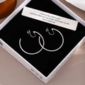 Silver round hoop clip-on earrings displayed in a premium black and white gift box - 4cm Silver/Ear Clip