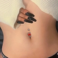 Silver devil heart belly button ring with red zircon stone on model's abdomen - Devil's Heart Dangle (A-1457)