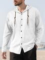 Close-up of white cotton linen shirt featuring a drawstring hood and brown buttons - S / Tops / White