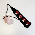 Handmade crochet headband in black featuring vibrant red mushroom embroidery details - Black Mushroom