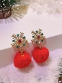 Detailed view of gold snowflake earrings with red pompom drops and colorful rhinestones - Red Snowflake Pom-pom
