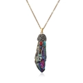 Rainbow crystal pendant necklace with golden chain and seven chakra stones on white background - Rainbow