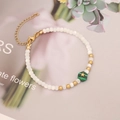 Detalle de pulsera de cuentas con dije de estrella verde y cierre de mosquetón dorado - 2# Verde Malaquita (Estrella)