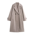 Detailed view of the lapel and double-breasted buttons on this wool coat for women - XS / Oatmeal