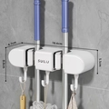 White wall-mounted mop holder with suction cups, two clips, and three hooks, 18.6cm wide - 2 Clips 3 Hooks Ivory White