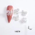 Detailed view of silver bow-knot nail charms with 9.5mm x 10mm size specifications - 1487# Silver Hollow Bowknot