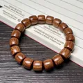 Bracelet ethnique en bois de santal vert avec des perles cylindriques aux grains naturels - Bois de Santal en Soie Dorée 10x11mm