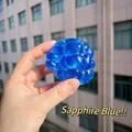 Juguete relajante azul zafiro translúcido con forma de pétalo y rebote suave lento - Bola Ruidosa Azul Zafiro