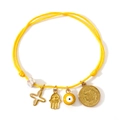 Yellow hand-braided cord bracelet featuring a gold cross, evil eye, and hamsa charms - Bright Yellow
