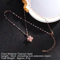 Collana rotante a quadrifoglio in oro rosa con zirconi e catena in acciaio al titanio - Stile Rotante 12/Quadrifoglio Oro Rosa