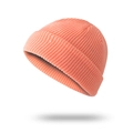Minimalist coral orange ribbed knit beanie hat in a street style docker cap design - Orange Pink