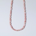 Summer beach necklace with pink abacus beads and golden spacers on white background - Pink Cylindrical Beads Style (B-N24022903C)