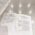 Detail of white heart-shaped beads and ribbon on a transparent phone case strap - White Heart Lanyard