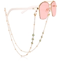 Pink lens sunglasses with gold metal frame and green daisy flower eyewear chain - Green Flower Style