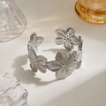Vintage matte silver open bangle featuring 3D floral design and brushed metal texture - Silver 3D Flower