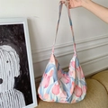 Large canvas tote bag featuring yellow fabric and pink tulip floral patterns - Pink Tulip