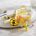 Lollipop liquid sand keychain with colorful beads, large golden bell and yellow handle - Bell Style [Lemon Yellow]