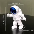 Miniature white astronaut figurine with blue electroplated visor and dimensions shown - Small Plated Blue Model B