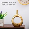 Moderne luxe holle gouden keramische vaas met metallic afwerking, hoogte 24cm decor - Klein / Goud