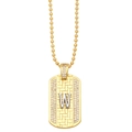 Close-up of golden dog tag pendant with silver letter W and cubic zirconia side accents - Letter W