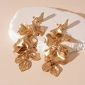 Detail of golden long tassel petal earrings with screw-back clips for non-pierced ears - Gold Petal Clip-on Earrings