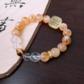 Golden rutilated quartz beaded bracelet with zircon accents on a zen wooden background - 51# Yellow Square