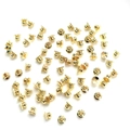 Bulk gold plated flower bead caps and jewelry accessories on white background - 14K Gold