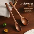 Two-piece natural wood spoon set including a round soup spoon and a long stirring ladle - Soup Spoon + Stirring Spoon Set