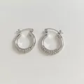 Silver C-shaped stainless steel hoop earrings with sparkling crystal pavé details - Silver White Zirconia Style (PDE1999)