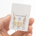 Golden double-layer 888 angel number pendant necklace on white display card - Cutout 888 / Gold