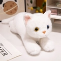 Lifelike white plush cat doll with realistic heterochromia eyes in a lying pose - White Cat