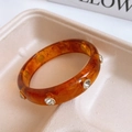 Close-up of amber resin open bangle with marble texture and sparkling rhinestones - 41# Rhinestone Metal Inlay (41# Bracelet - Red - White)