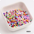 Macro shot of 3mm colorful round glass seed beads in a white bowl for DIY jewelry making - 10g Approx 288 Pcs / KK01 Mixed Colors