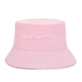 Close-up of pink cotton bucket hat featuring white 'It was a dream' embroidery detail - One Size / Pink
