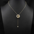 Elegant gold sweater chain featuring fresh water pearls with a golden ginkgo leaf pendant - Ginkgo Leaf Pearl Ring Tassel Necklace