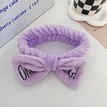 Purple coral fleece headband with oversized bow and black OMG! embroidery detail - Purple