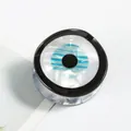 Pinza para el pelo redonda con diseño de ojo turco azul y blanco y acabado pulido - Borde negro azul iridiscente / [atributos Del Producto]: Visualmente Se Trata De Un Accesorio Para El Cabello De Diseño Redondo (como Una Pinza O Una Goma Para El Pelo) Con El Clásico Motivo Del "ojo Turco". El Cuerpo Principal Presenta Un Brillo Iridiscente Similar Al Nácar Decorado Con Rayas Horizontales Azules Y Un Punto Central Negro Rodeado Por Un Anillo Negro Pulido. La Base Parece Estar Hecha De Un Material Azul Semitransparente. [presentación Visual]: La Imagen Está Tomada Desde Arriba Con Un Fondo De Cartulina Blanca Simple. Calidad De La Imagen: Media. [la Superficie Del Producto Presenta Muchos Reflejos Irregulares Y Poco Definidos Lo Que Afecta La Percepción De La Textura Del Material]. Estética: Media. Puntuación General: 7.2. [el Fondo Es Demasiado Plano Y Contiene Colores Mezclados; La Iluminación Carece De Calidad Artística Y El Atractivo Del Producto Es Promedio]. [contenido Del Texto]: El Grupo "to_remove" Contiene Los Caracteres Chinos "戈蕾思" En La Esquina Superior Izquierda. El Grupo De "marcas De Agua" Contiene Un Icono "g" Añadido Posteriormente Y La Palabra "grace" Que Deben Eliminarse. [etiquetas Logísticas]: Ninguna [riesgo De Infracción]: Infracción De Producto: Ninguna. Infracción De Fondo: Ninguna. 【parámetros Del Producto】: Características De Apariencia: Redondo Azul Blanco Y Negro Patrón De Ojo Turco Textura Pulida.