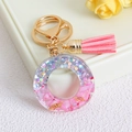 Pink glitter resin letter O keychain with golden music notes and matching suede tassel - Letter O / Pink