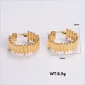 Golden 3D cylindrical textured stainless steel hoop earrings with unique geometry - Amleh016