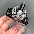 Close-up of handmade hair comb with clear crystal raw stones and silver crescent moon - Hair Comb / Black